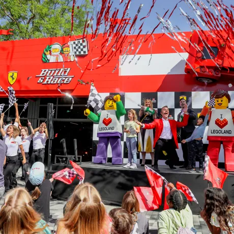 Confetti fills the air at the Ferrari Build and Race Opening Celebration at LEGOLAND California
