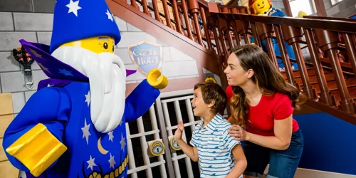 Mom and son meet Merlin the Wizard at the LEGOLAND Castle Hotel