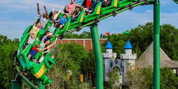 Guests riding The Dragon coaster at LEGOLAND California