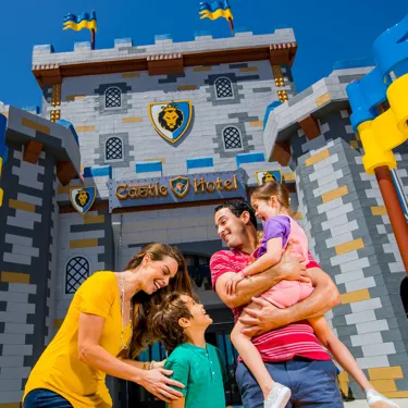 Family in front of LEGOLAND Castle Hotel