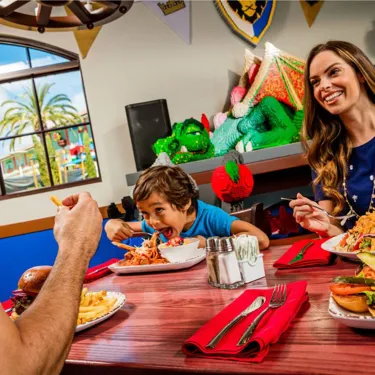 Family eating dinner at Dragons Den