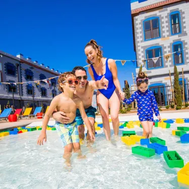 Family enjoying the Castle Hotel pool