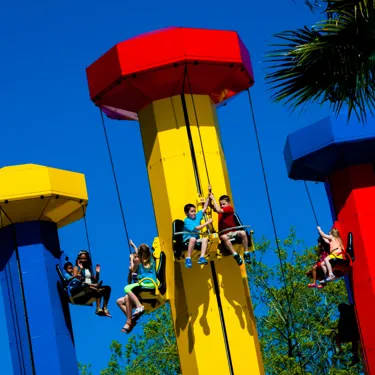 Kids riding Kids Power Tower