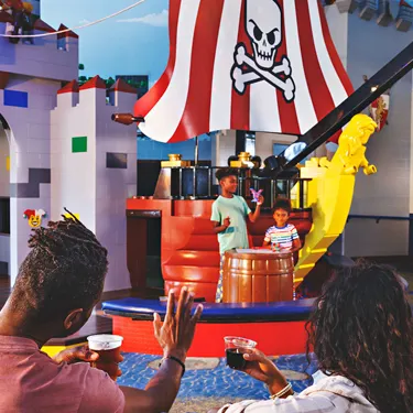 Kids Play in the LEGOLAND Hotel Lobby while Parents Enjoy a Drink