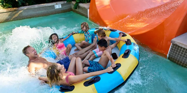Family riding Orange Rush at Legoland California Water Park