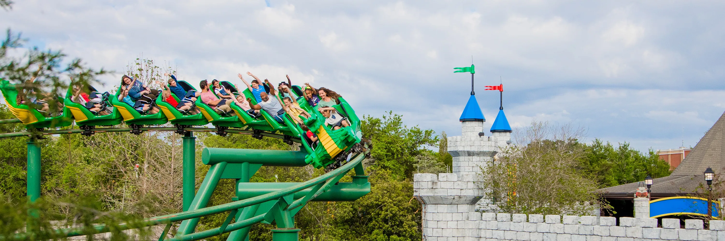 Guest enjoying Dragon Coaster