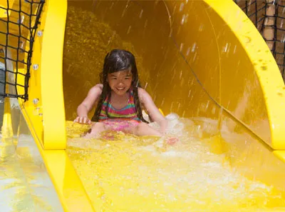 Kid sliding down Crug's Run
