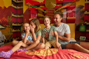 Family Enjoying a LEGO NINJAGO Room at the LEGOLAND Hotel